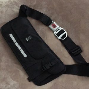 sling bag with seat belt buckle